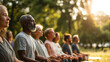 © xue - Group of Elderly People Meditating and Doing Yoga Outdoors for Wellness and Health Projects
