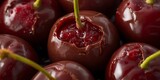 Glossy Dark Red Cherries Close-Up