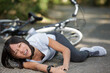 © auremar - young woman fell off mountain bike