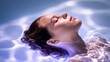 © dinatychynska - Woman floating in water with closed eyes, serene spa relaxation. Peaceful aquatic therapy and hydrotherapy concept, wellness and meditation in pool, tranquil beauty treatment moment.