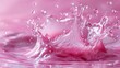© Ummeya - Close up of a pink liquid splash with many droplets in a circular formation