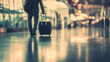 © Alpaca - malaysian. A solitary traveler in a modern airport terminal, blending contemporary travel with subtle cultural elements. tourism brochures.