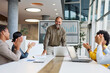 © Lumos sp - Group of young business people having a meeting or presentation and seminar with digital display whiteboard in the office. Portrait of a young businessman leader