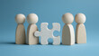 © Furkan - Wooden Figures Team With Puzzle Piece. Teamwork, Collaboration, Problem Solving, Diversity and Business Solution Concept.