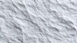 © morepiixel - A textured white surface with visible ripples and folds, resembling crumpled paper or a rugged wall, creating an artistic and abstract appearance.