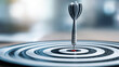 © kaliel - Dart hitting the bullseye to illustrate precision, goal achievement and targeted execution.