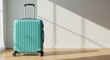© Running opossum - teal travel suitcase with retractable handle in sunlit room on wooden floor