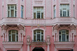 © Studio KME/Stocksy - Pink Facade with Ornate Windows in Prague
