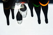 © Pietro Karras/Stocksy - Shadows of wine glasses and bottles on surface