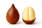Fresh salak or snake fruit with white crisp flesh inside scaly brown skin.
