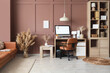 © Pixel-Shot - Interior of modern office with workplace, shelving unit and sofa near brown wall