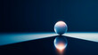 © Jess rodriguez - A luminous sphere balanced on the edge of a mirror, a concept of fragile perfection