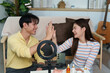 © itchaznong - Inclusive Wellness. Young couple enjoying playful moment during skincare routine at home.