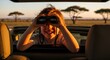 © photoplotnikov - Young caucasian child on safari adventure in africa's scenic landscape