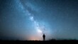 © irawan - Silhouetted human observes vibrant band of stars across the dark night sky