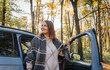 © olezzo - Road trip vacations woman tourist traveling by rental car active lifestyle outdoor