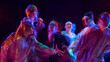 © master1305 - Street dance group illuminated by vibrant motion blur light. Concept of creative performance, modern youth advertising visuals symbolizing teamwork, flow, and vibrant artistic style.