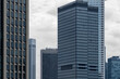 © yaqui_villegas - Modern urban architecture and finance skyline of Frankfurt cityscape showing glass business towers and highrise buildings in clear morning light