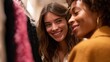 © fotofabrika - Friends shopping together and enjoying each other's company in a stylish boutique