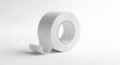 © Jamilatul - Close-up of a roll of white adhesive tape on a clean white background, isolated studio shot