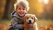 © miss irine - Happy child, golden retriever puppy smile, sit on ground. Boy hugs dog in autumn park, surrounded by colorful fall leaves. Child, pet friend play outdoors, enjoying nature. Joyful kid, loyal