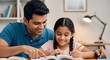 © SenpaiNoticeMe - Man helping young girl study at desk indoors as they look at open book together with pencil in hand in home learning environment for education activity, homework assistance task and academic content u