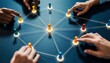 © Rifqi - Hands connecting game pieces with light trails representing a network on a blue surface, concept for social media marketing connectivity, business strategy and global communication
