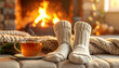 © Monmeo - Cozy Winter Evening by the Fireplace: A warm and inviting scene, featuring a crackling fireplace, a steaming cup of tea, and cozy knitted socks, perfect for a relaxing winter evening.