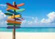 © CoralFox - Empty wooden pole with colorful signs against a tropical beach with turquoise ocean waves in the background. Signboard for travel destination with copy space for text. Summer vacation concept.