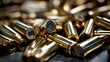 © Jibber  - Nahaufnahme von glänzenden Patronenhülsen auf dunklem Hintergrund