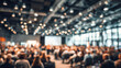 © Volodymyr Shcherbak - blurred people in a conference hall background