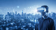 © Celt Studio - Man wearing vr headset in futuristic city for concept of metaverse, virtual reality, augmented reality, and business technology