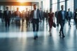 © SADEWA - Crowd of business people walking in office fast moving with blurry business
