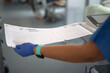 © Carmen - Doctor or nurse reviewing patient's ecg heart test results for diagnosis