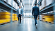 © Denis Yevtekhov - Long exposure warehouse with motion blur defocused workers, faceless facility activity, modern visualization detail, blurred movement background, warehouse operations concept, indu