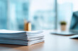 © Denis Yevtekhov - Bankruptcy documents stacked on desk with defocused office background, faceless insolvency concept, financial paperwork visualization detail, blurred corporate setting, debt docume