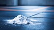 © PB Studio - macro shot of fine white magnesium powder scattered on dark gym surface, used as anti-slip grip for athletes’ hands during weightlifting or climbing, texture details visible, copy space on side.