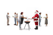 © Ljupco Smokovski - Santa Claus at a barbecue party with a group of people