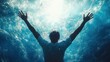 © oppo - Person underwater reaching upwards towards bright sunlight with arms spread wide expressing freedom and hope
