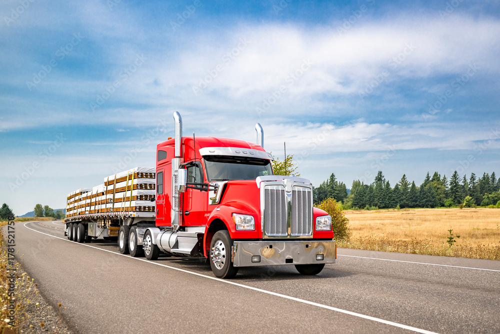 Bright red bonnet big rig semi truck with chrome accessories ...