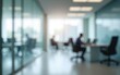 © Isabella - Blurred office space with glass walls and tables in the blurred background, minimalist style. High quality