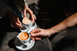© Westend61 - Couple enjoying coffee together with latte art in relaxing atmosphere