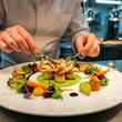 © rafani - Chef Arranging Exquisite Gourmet Plate of Mushrooms and Vegetables.