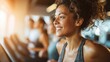 © The Little Hut - Smiling African American Woman Working Out on Treadmill at the Gym, Focused on Fitness