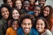 © miss irine - Diverse group of happy young adults smile broadly, looking up at camera. Express genuine joy, friendship, positive energy. Many different races, cultures, ages unite, bonding closely with happy