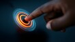 © kirania - Human finger interacts with a glowing digital interface element in a dark setting.