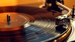 © Alex - Spinning vinyl record on a turntable with warm golden light