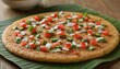 © 현욱 김 - Delicious Indian Uttapam Dish with Fresh Vegetables on Banana Leaf