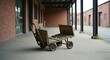© ary - Old industrial trolley abandoned on a concrete walkway outside a brick building.