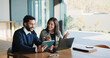 © BuyOutFelix04/peopleimages.com - Happy team, business people and planning in meeting with tech, financial solution or feedback. Laptop, office and discussion with tablet for investment idea, proposal and project success in company